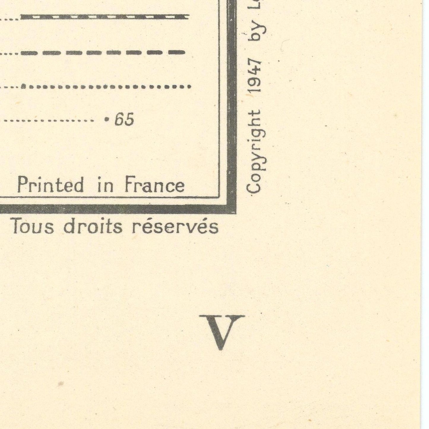Corner of a book or document with text and copyright information on a beige background