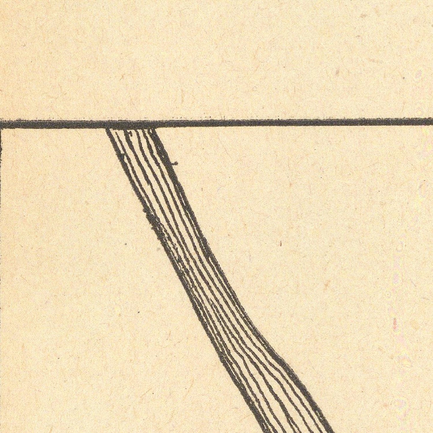 Close-up of a printed line on beige paper