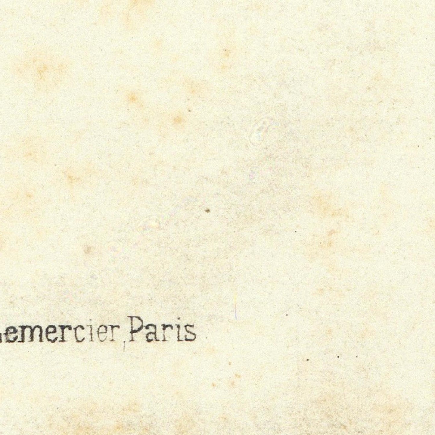 Text 'emercier Paris' on a textured beige background