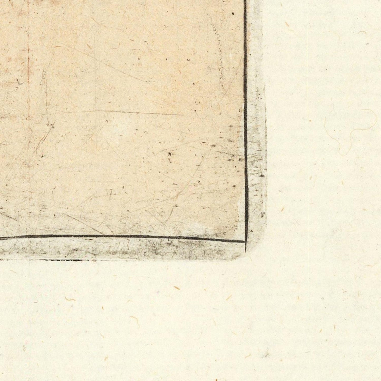 Close-up of a textured beige surface with a corner and a black line.