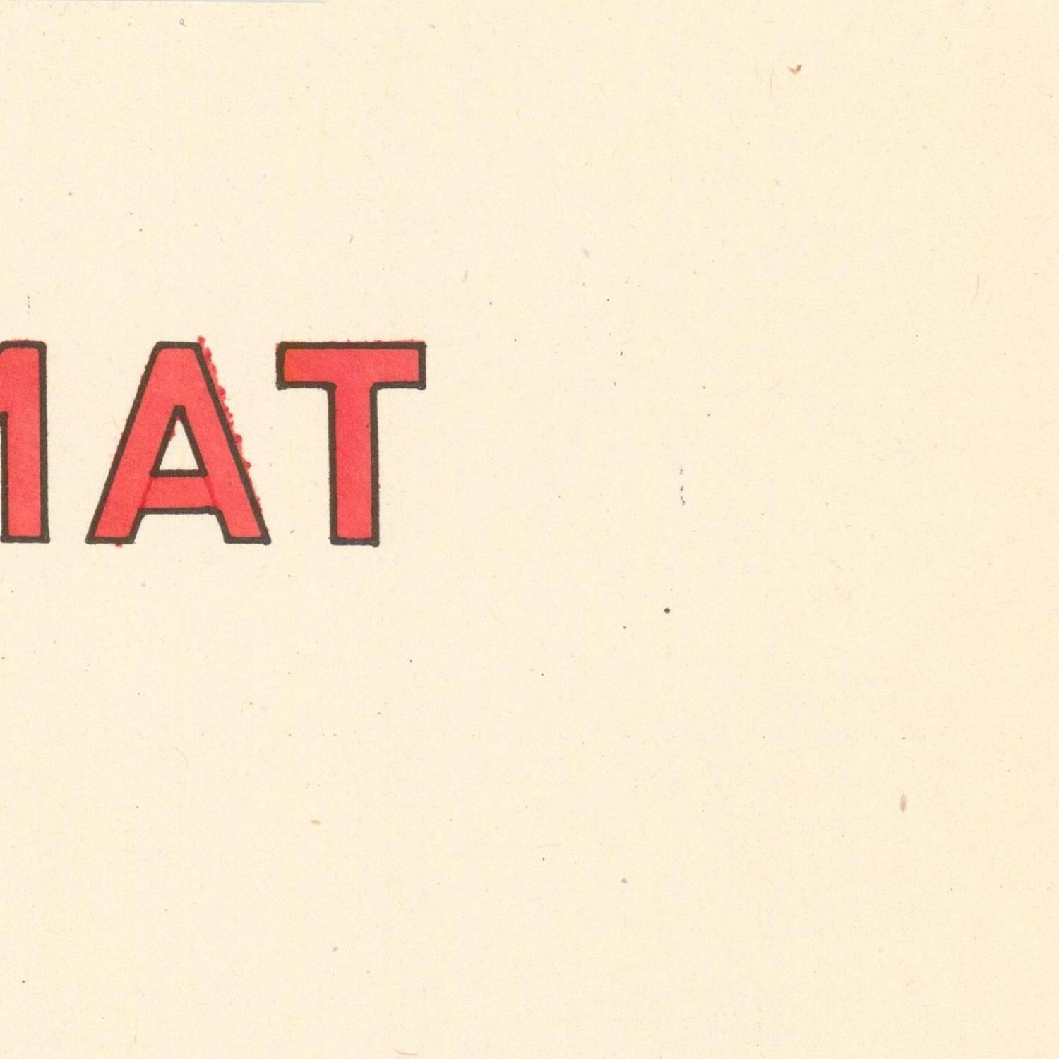 Partial view of a word with red letters on a beige background