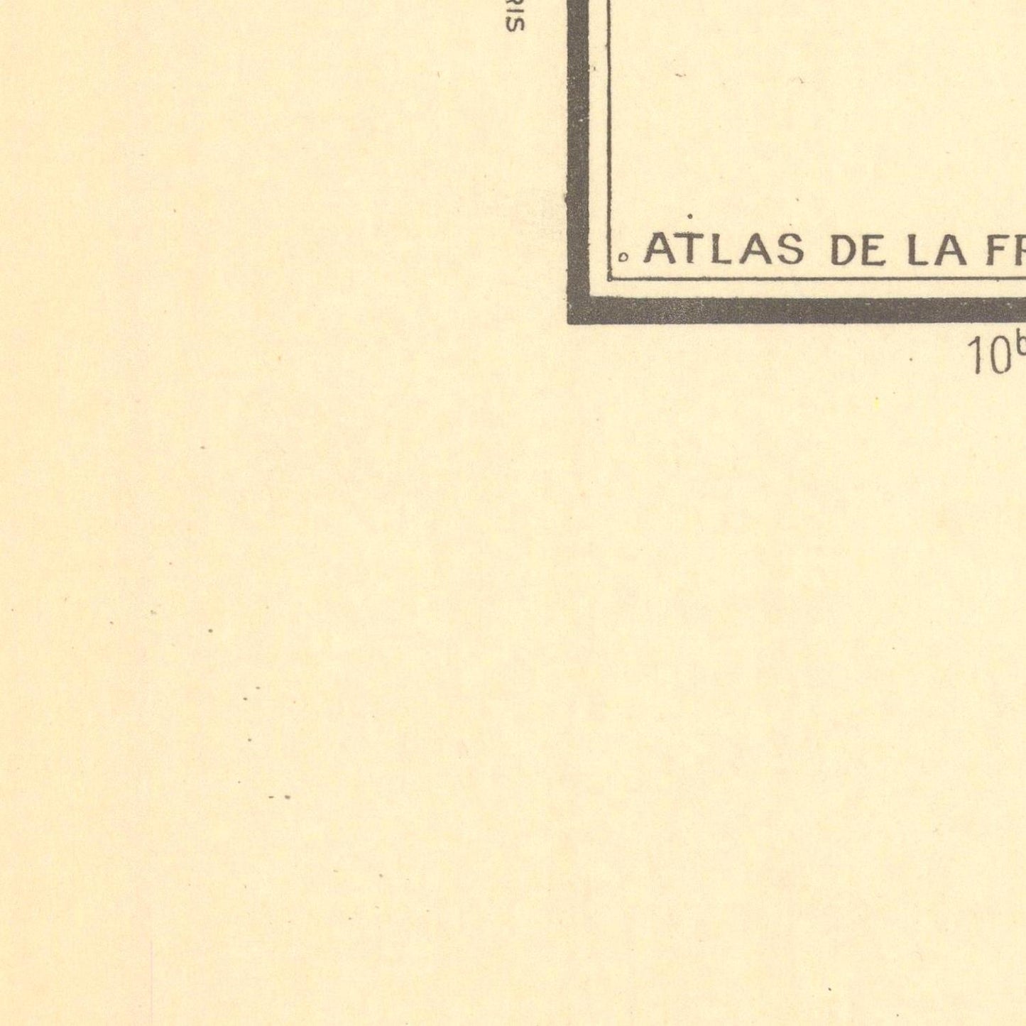 Partial view of a document with 'Atlas de la France' text on a beige background
