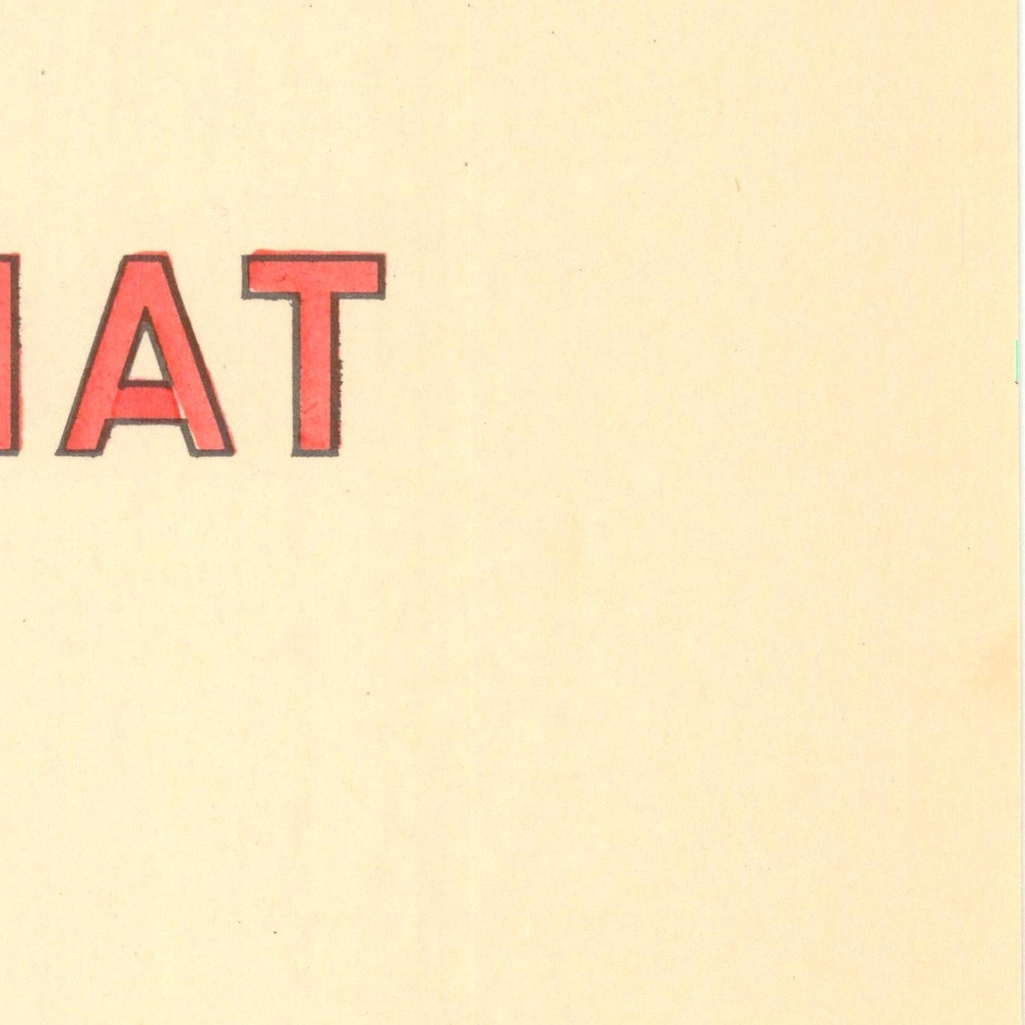 Beige background with red text 'AT' on a yellow border