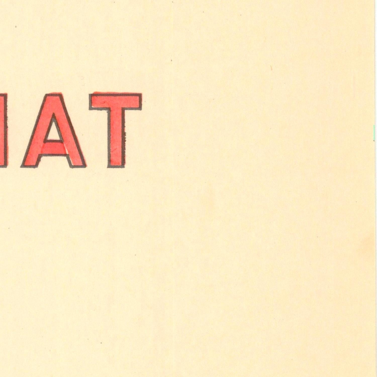 Beige background with red text 'AT' on a yellow border