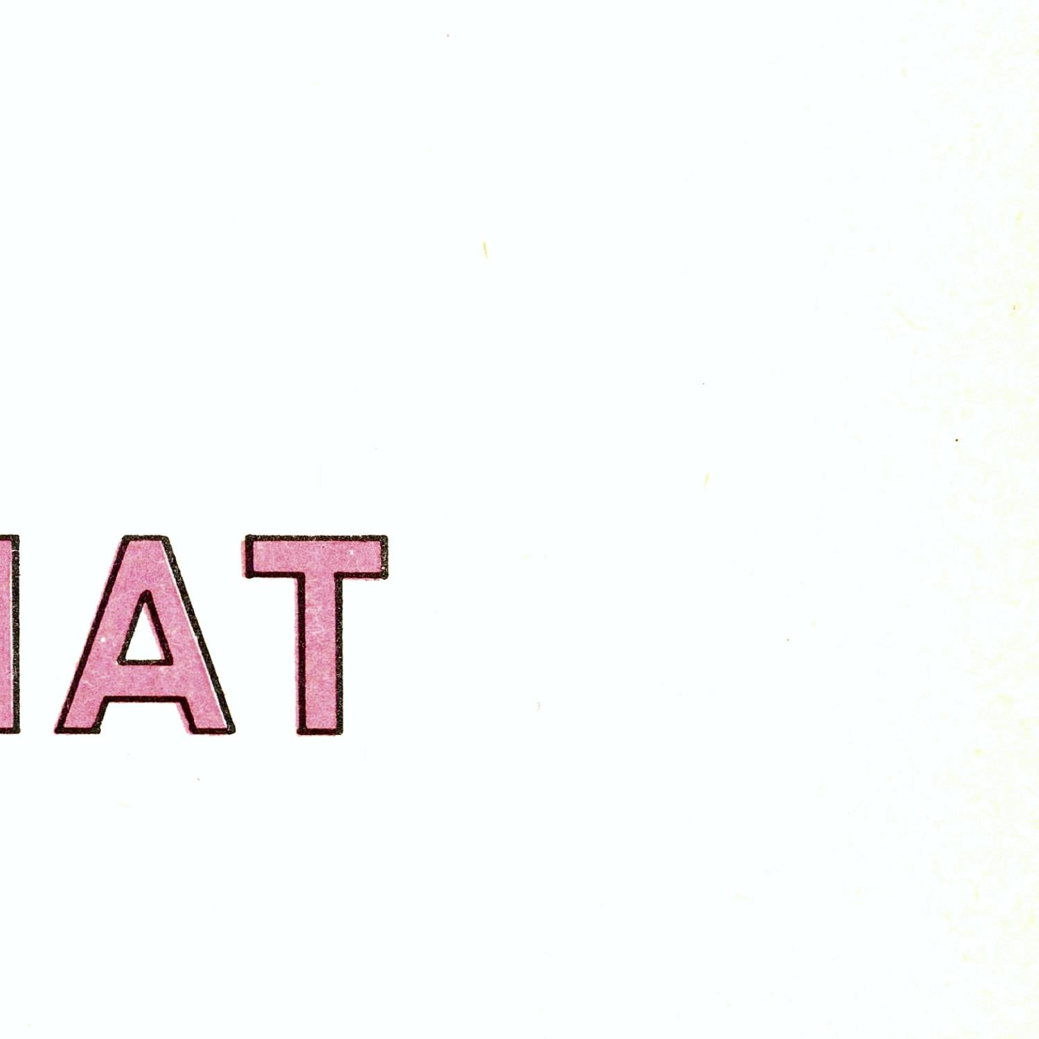 Partial view of a word 'AT' in pink on a white background