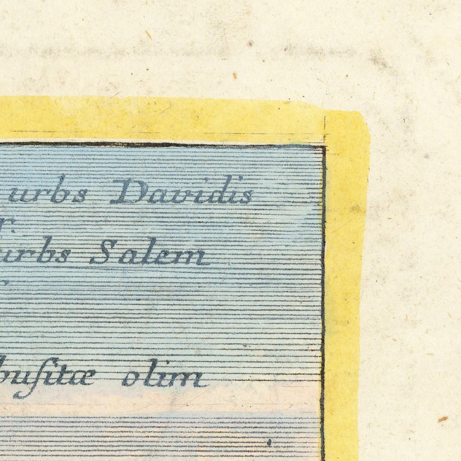 Close-up of a vintage map corner with text and a yellow border.