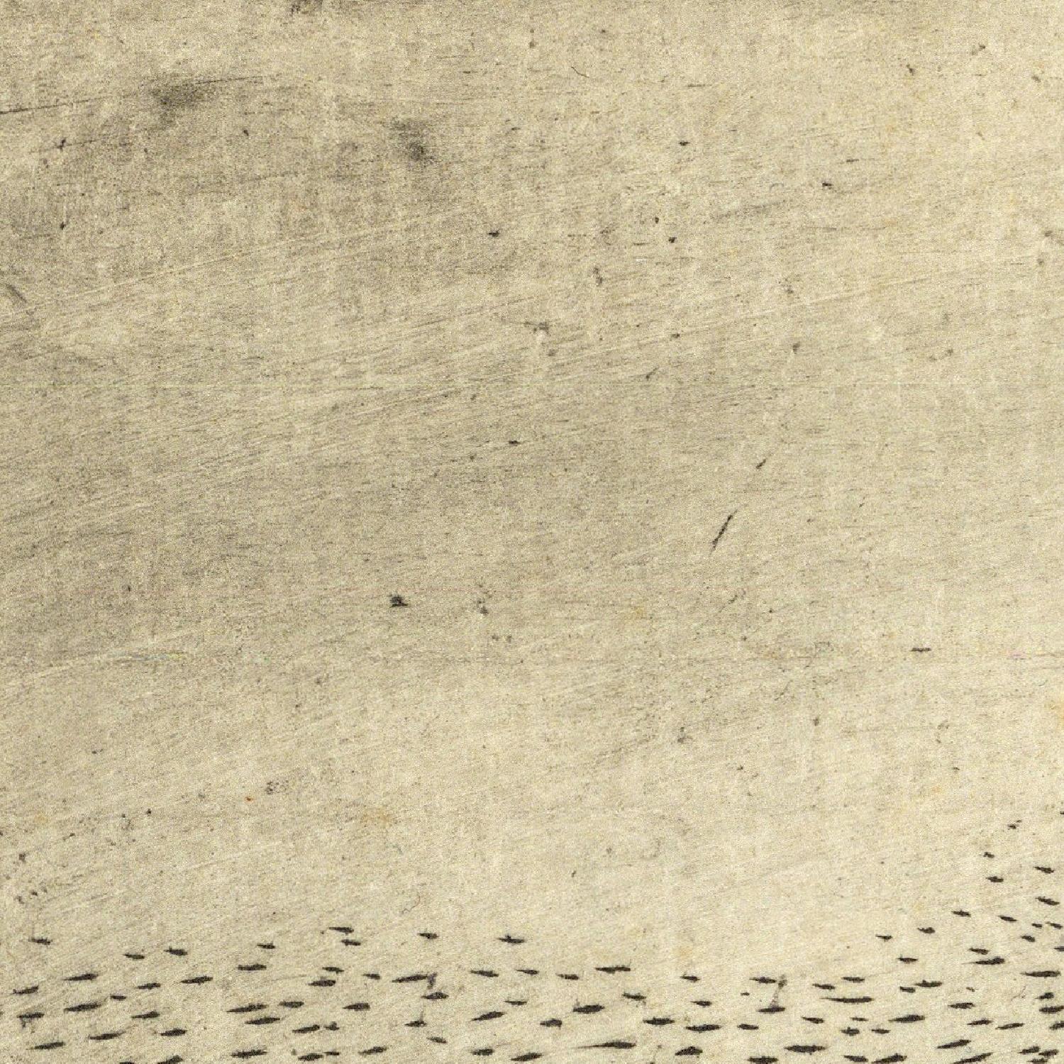 Close-up of textured beige paper with printed text