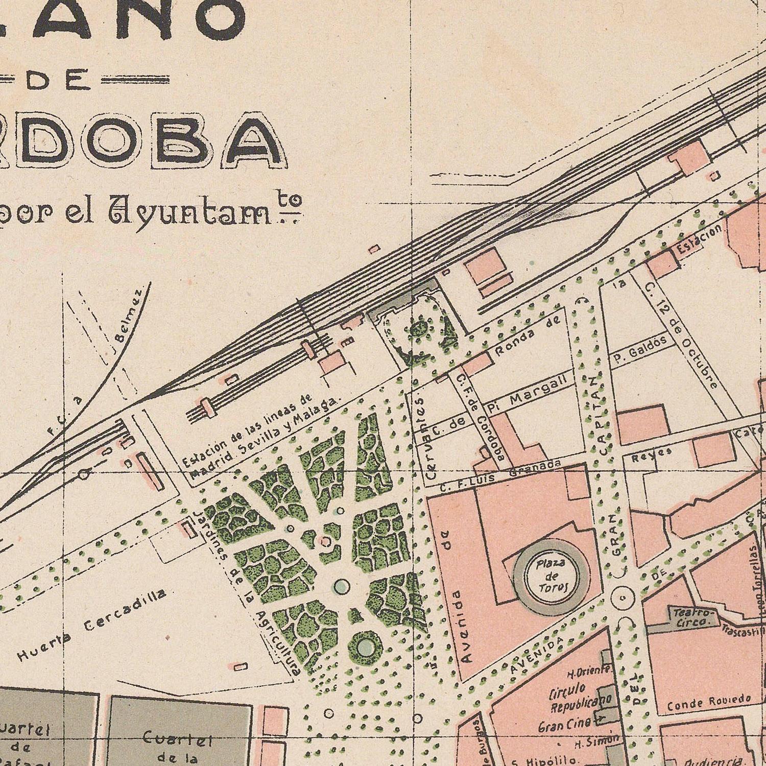 Vintage map of a city layout with streets and parks, featuring text and color编码.