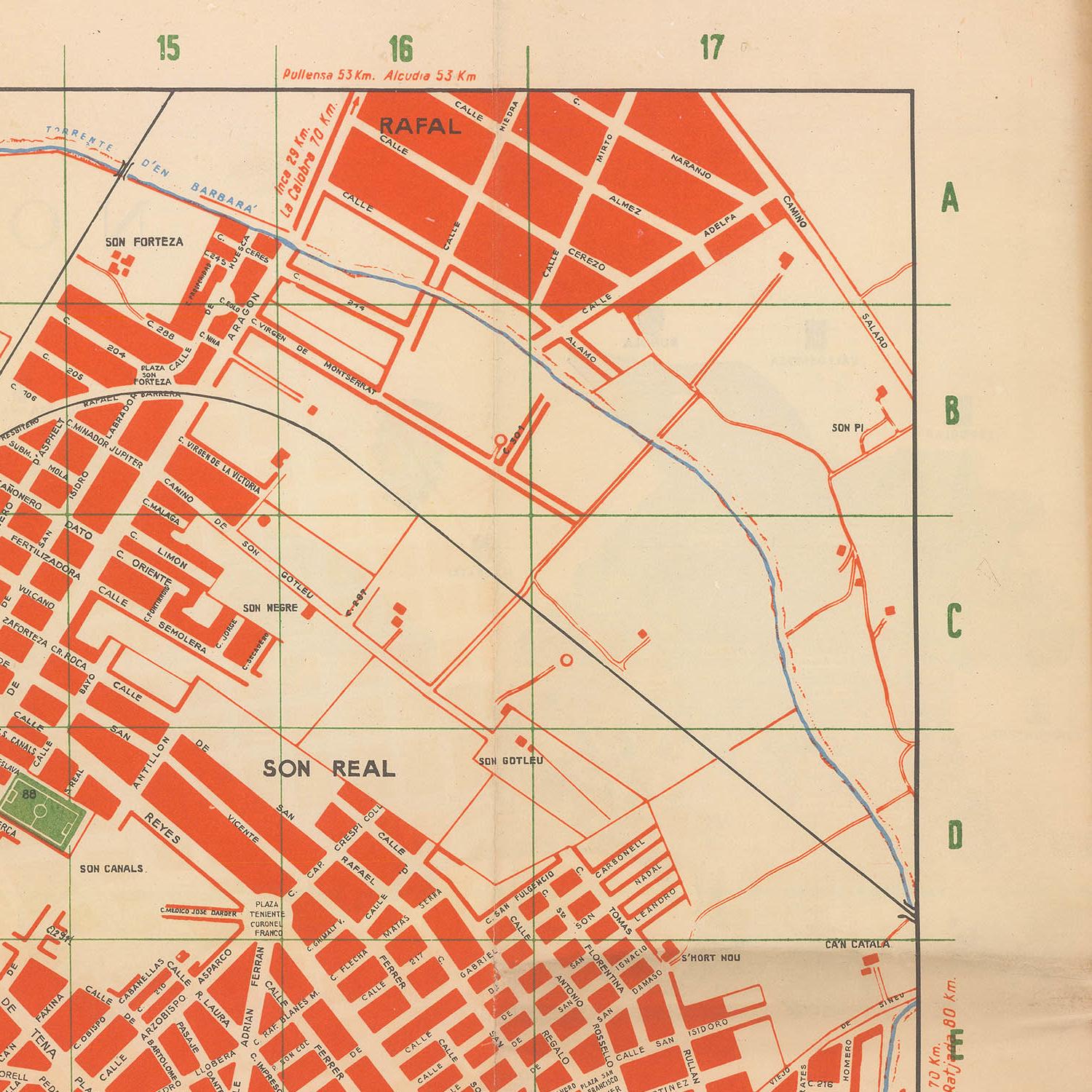 Vintage map of a city layout with red and black lines on a beige background