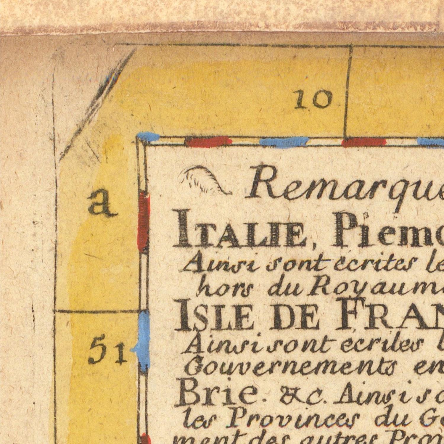 Close-up of an old document with text and numbers on a yellow background