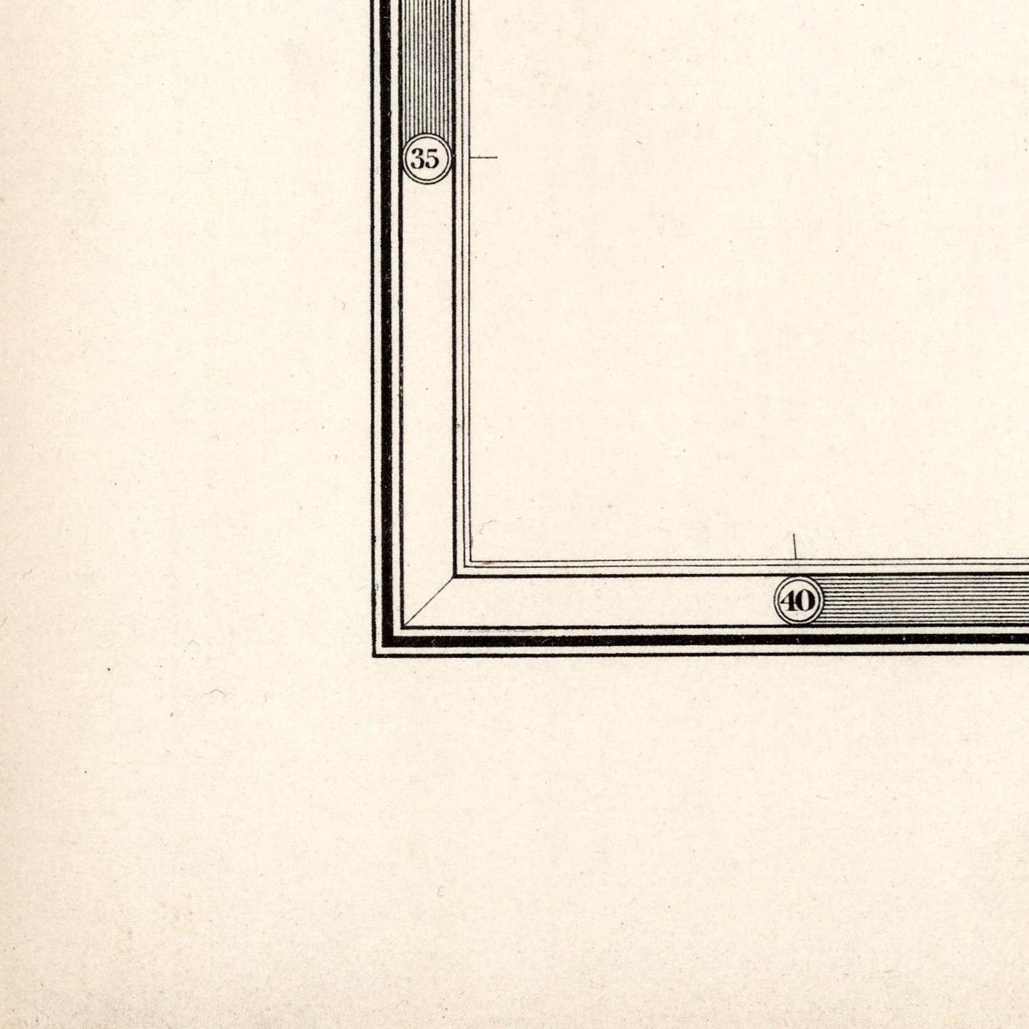 Corner of a picture frame with measurement markings on a beige background