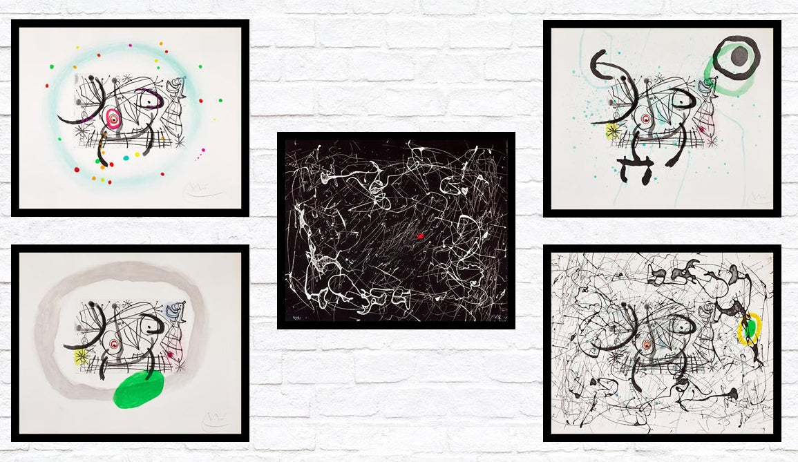 Framed fine art reproductions hanged up on the wall