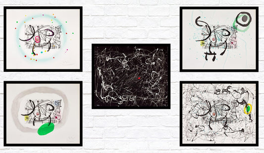 Framed fine art reproductions hanged up on the wall