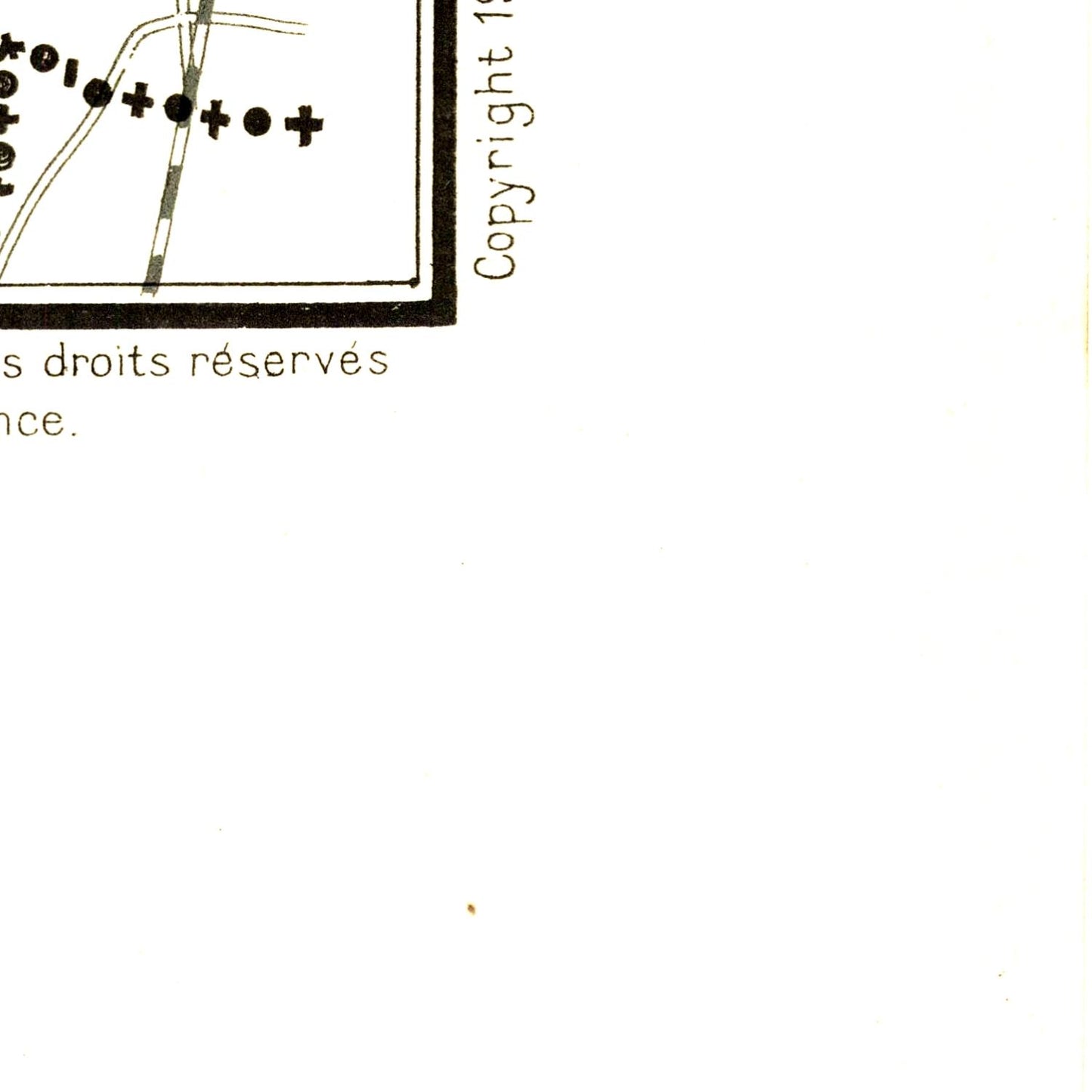 Corner of a document with text and a copyright symbol on a white background