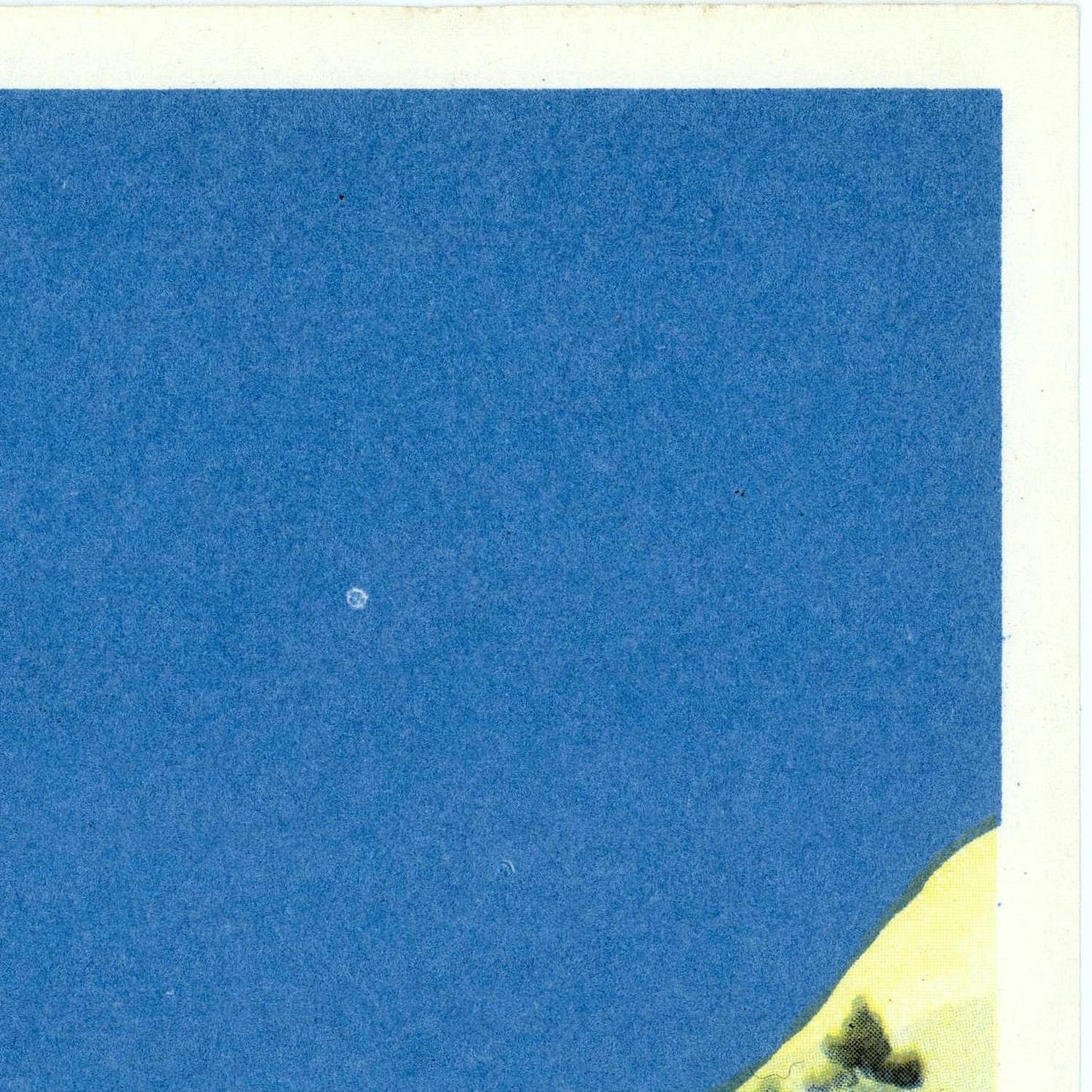 Small white dot on a blue textured background