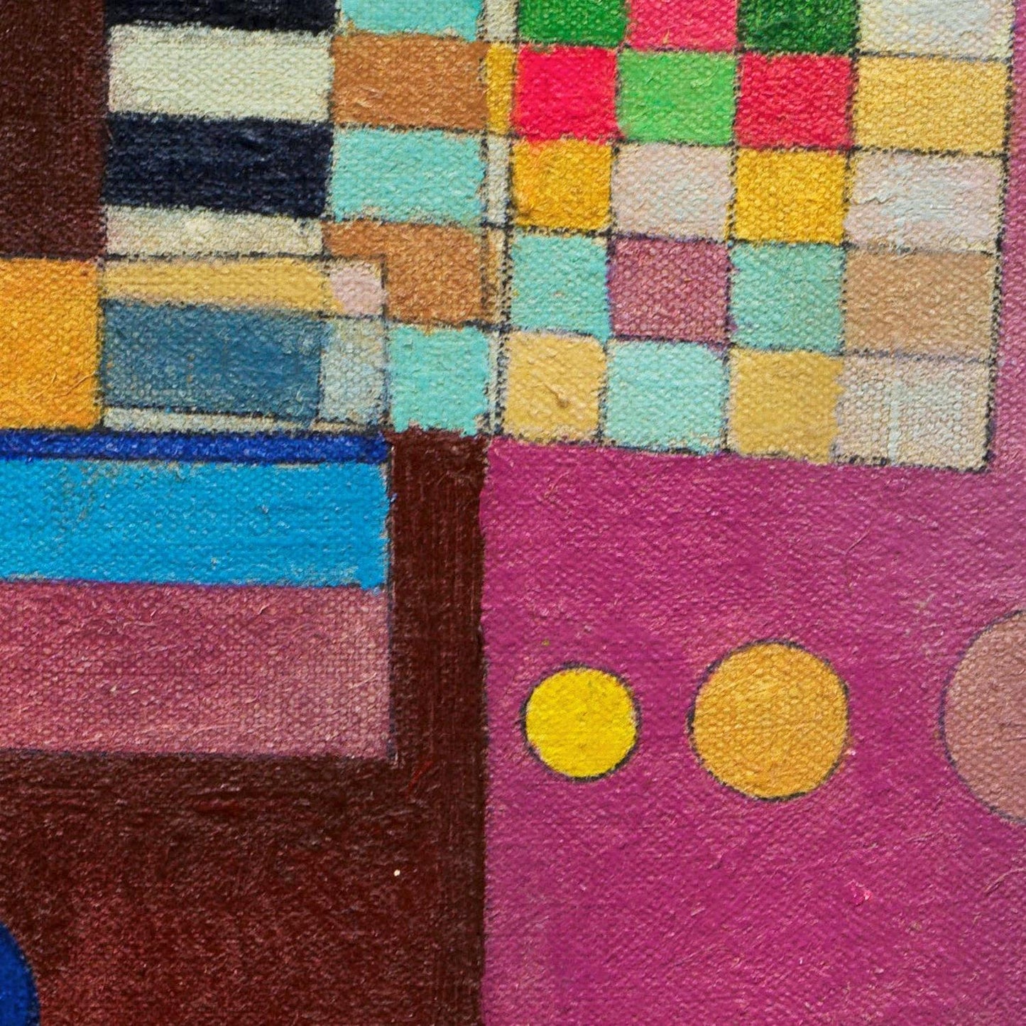 Close-up of a colorful textured surface with geometric patterns