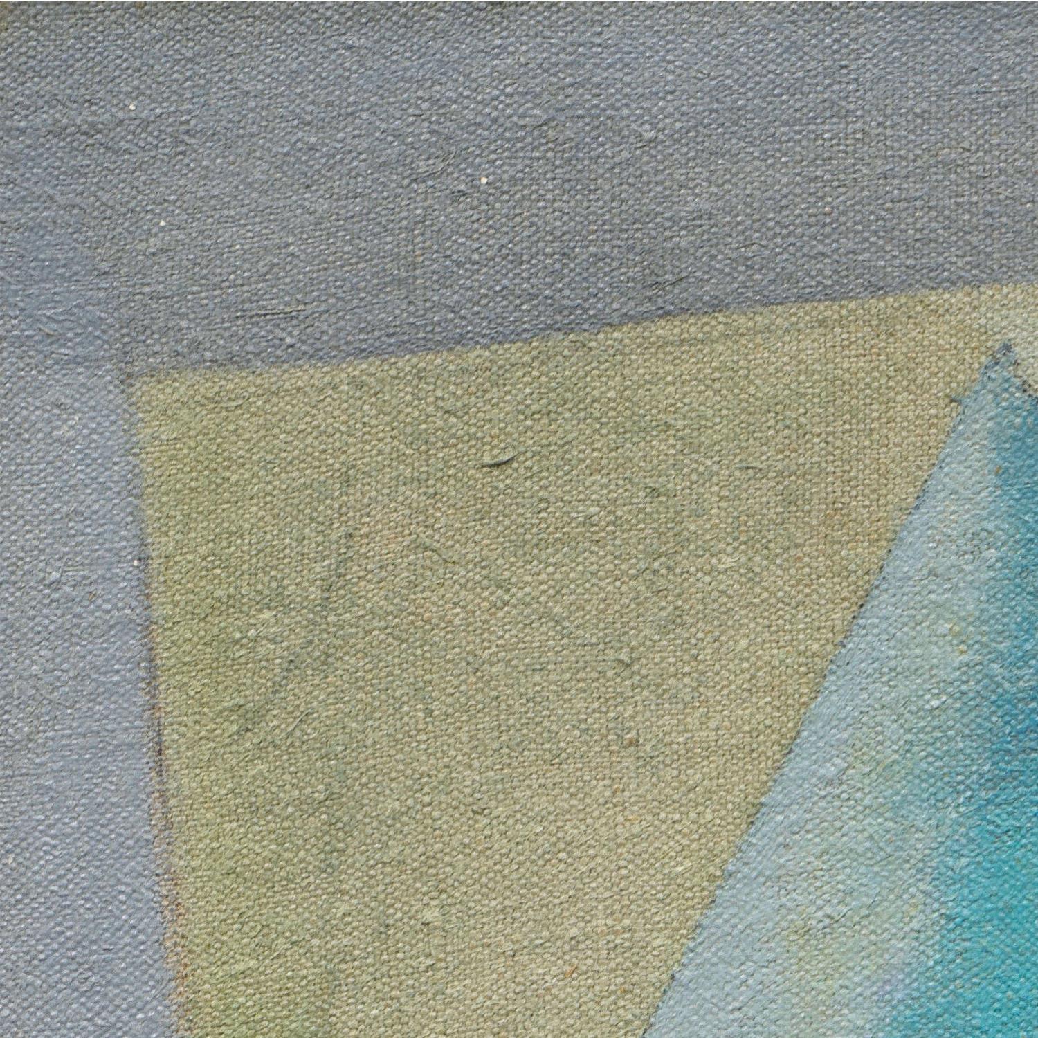 Close-up of a textured fabric with a gradient from gray to green to blue.