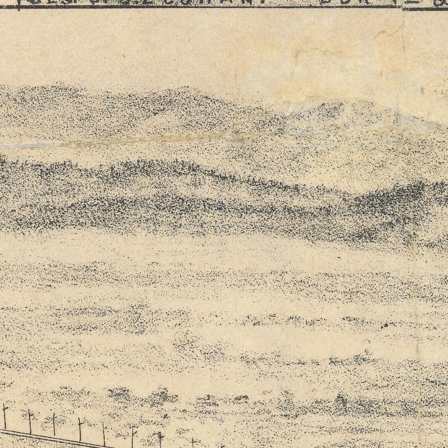 Textured beige surface with black speckles and a grid pattern