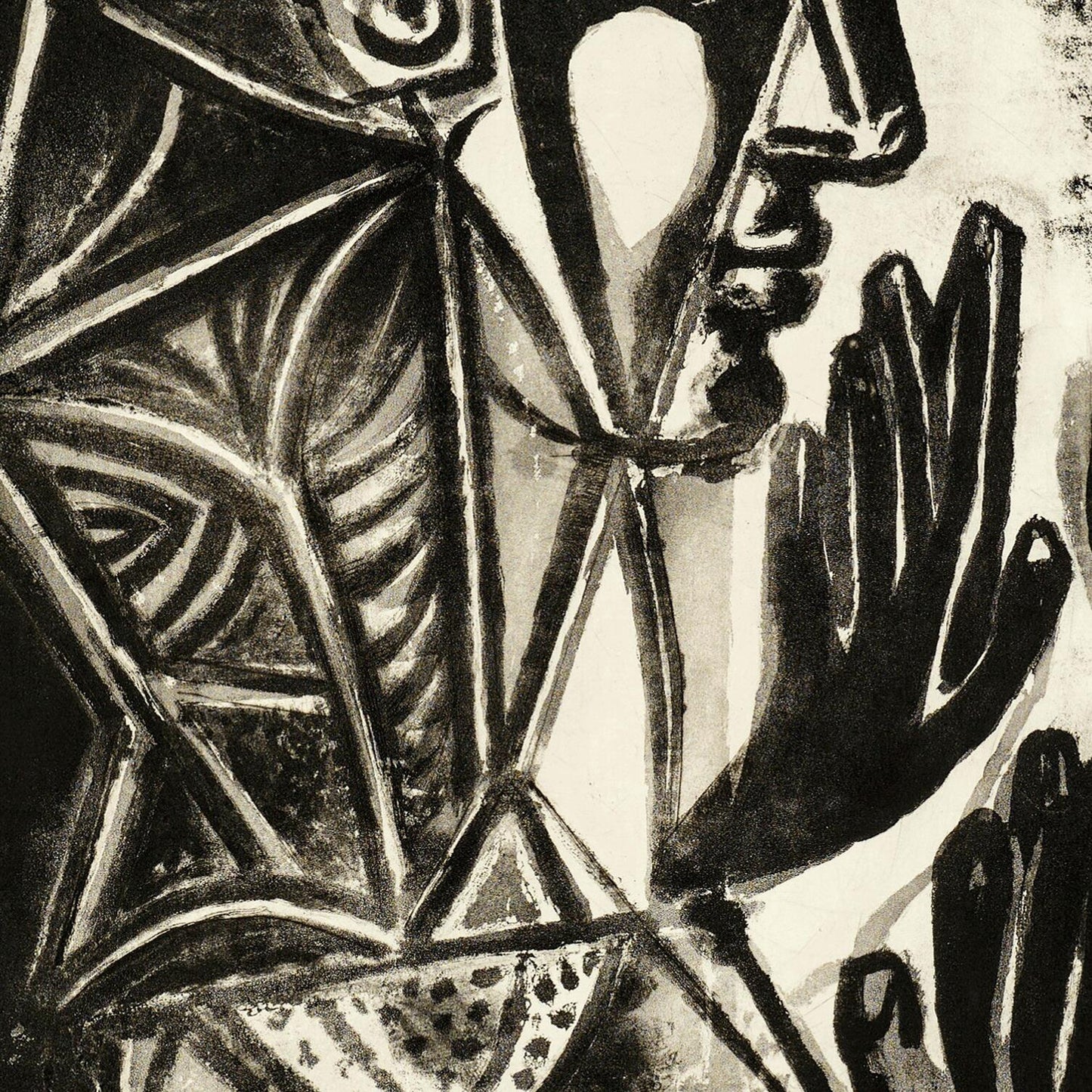 Black and white abstract artwork with geometric shapes and a face-like figure.