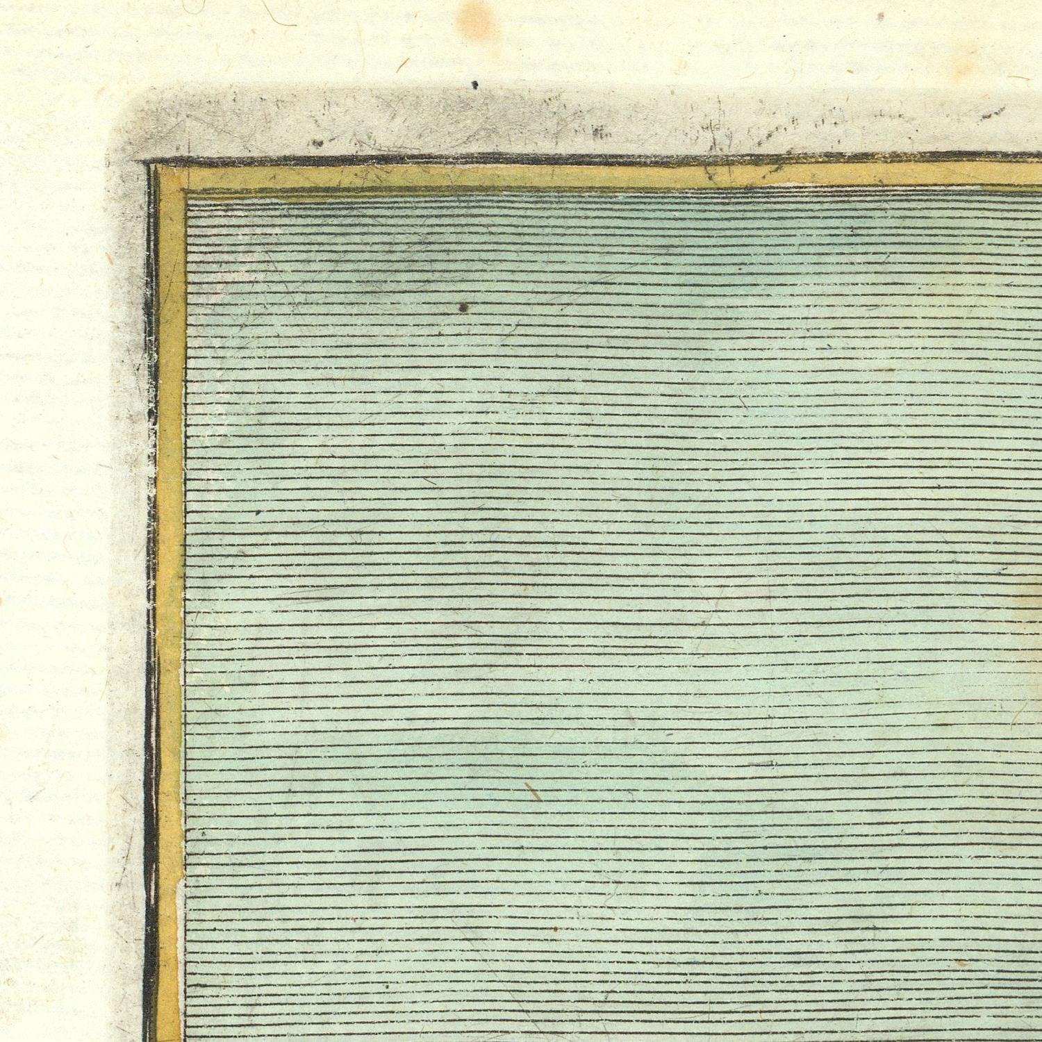 Close-up of a green air filter with a gold border on a beige background