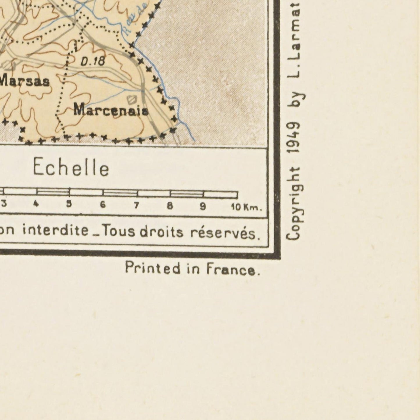 Vintage map with a scale and copyright information, printed in France.