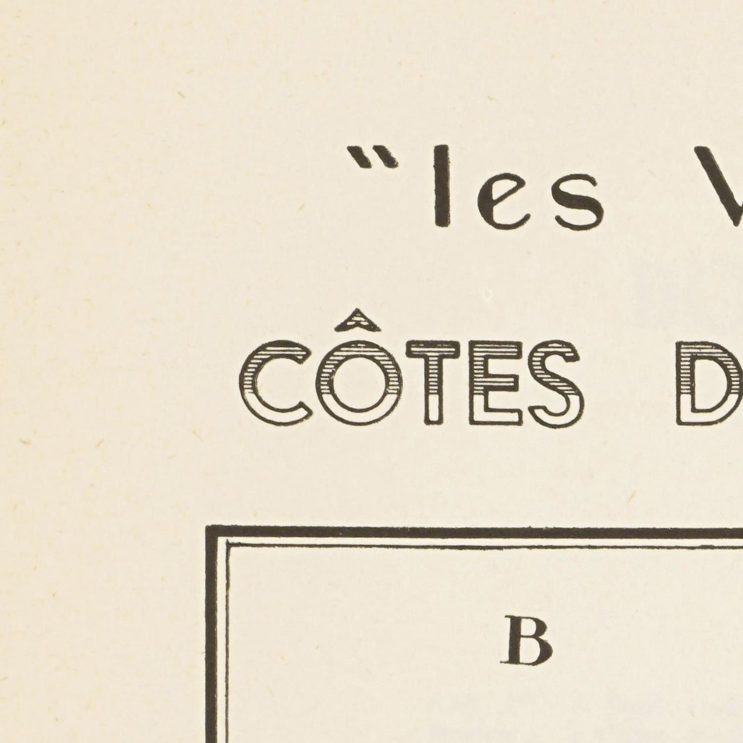 Vintage-style text on a beige background with 'les V' and 'Côtes D' partially visible