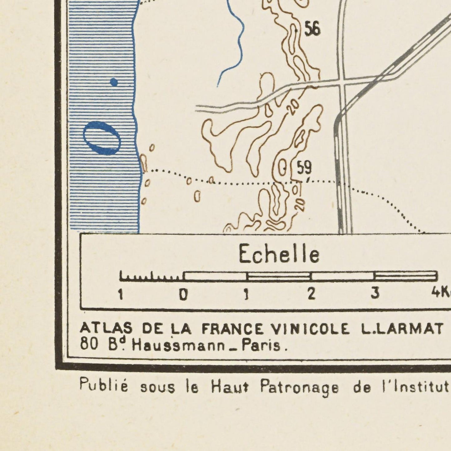 Vintage map with scale and text, featuring a small inset map and branding details.