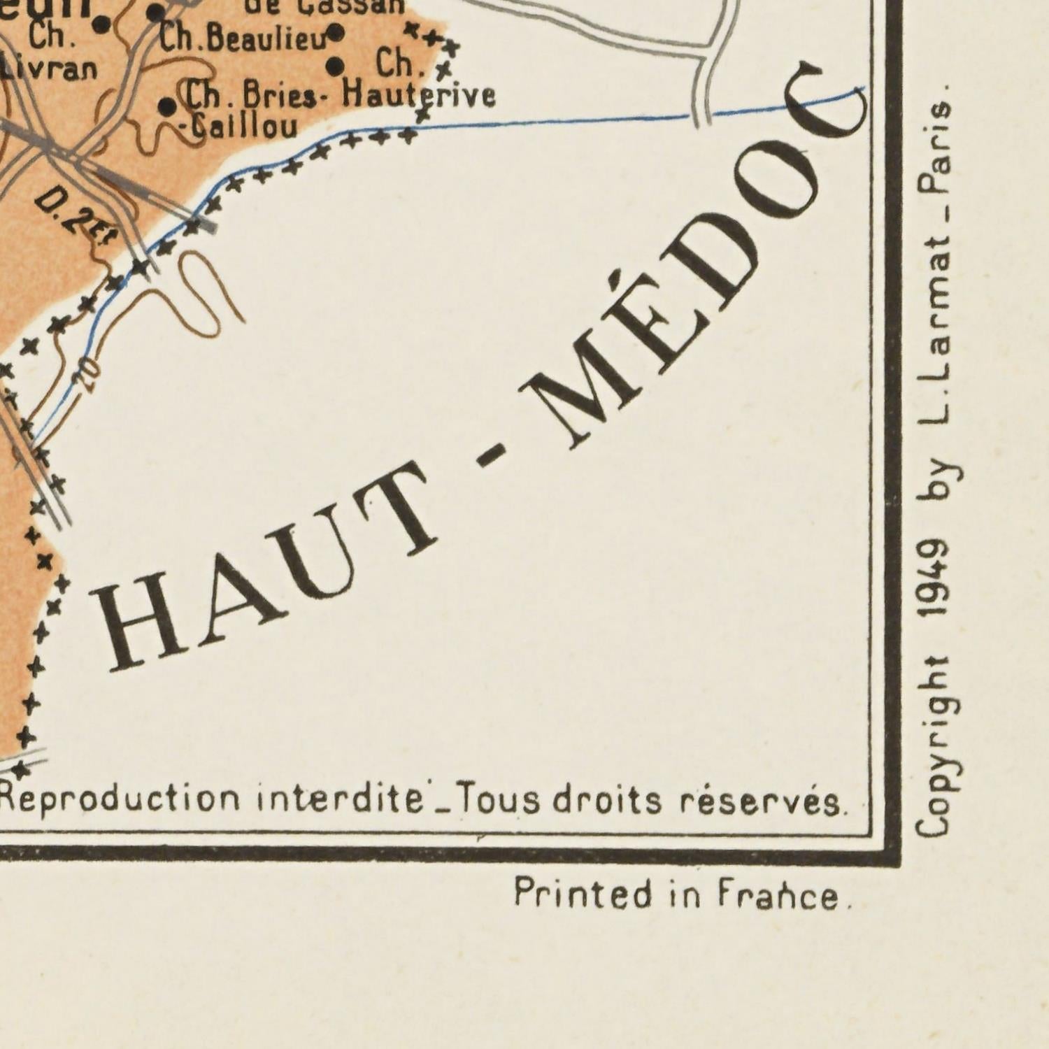 Vintage map label with 'Haut-Médoc' text and copyright information.