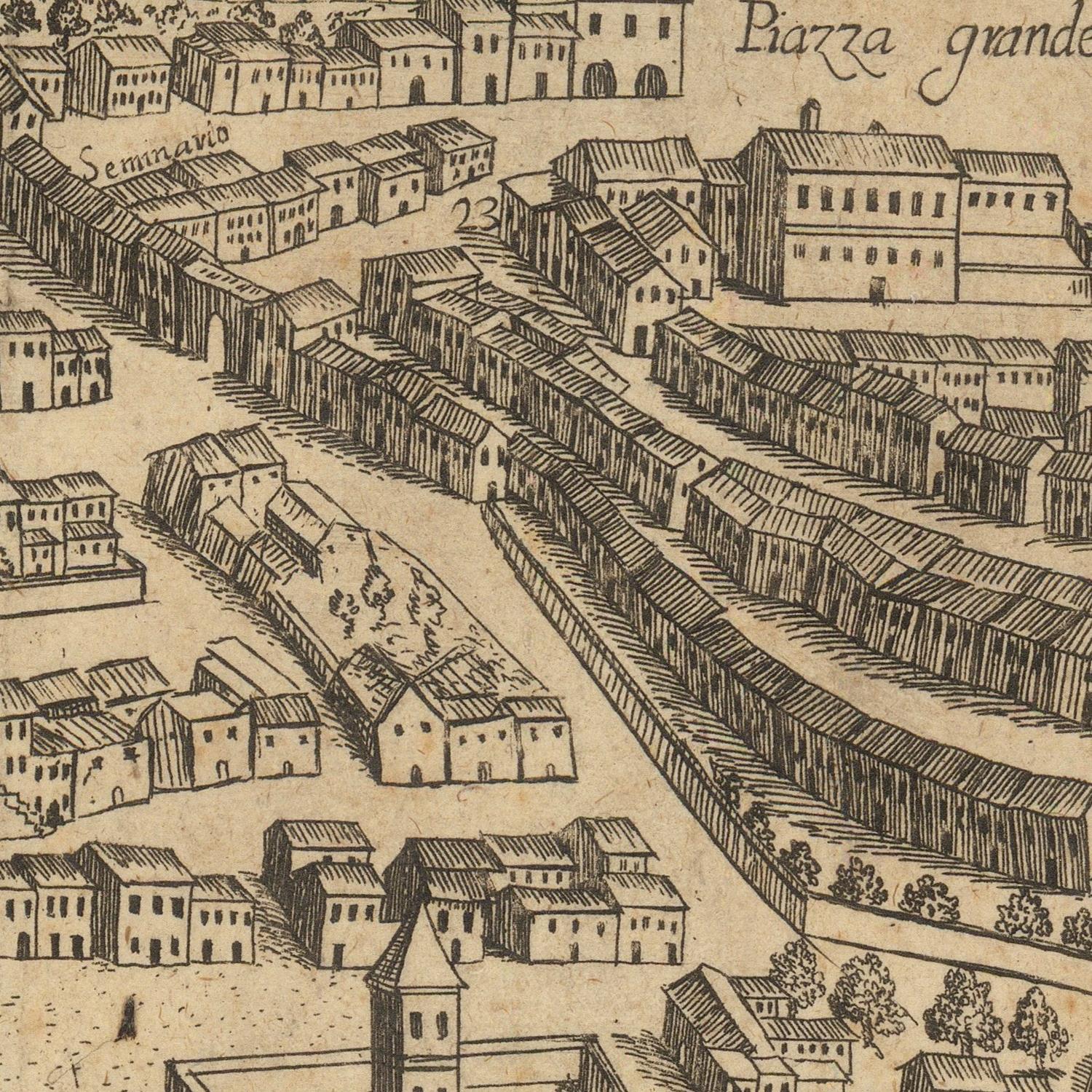 Vintage map or engraving of a town layout with buildings and streets.