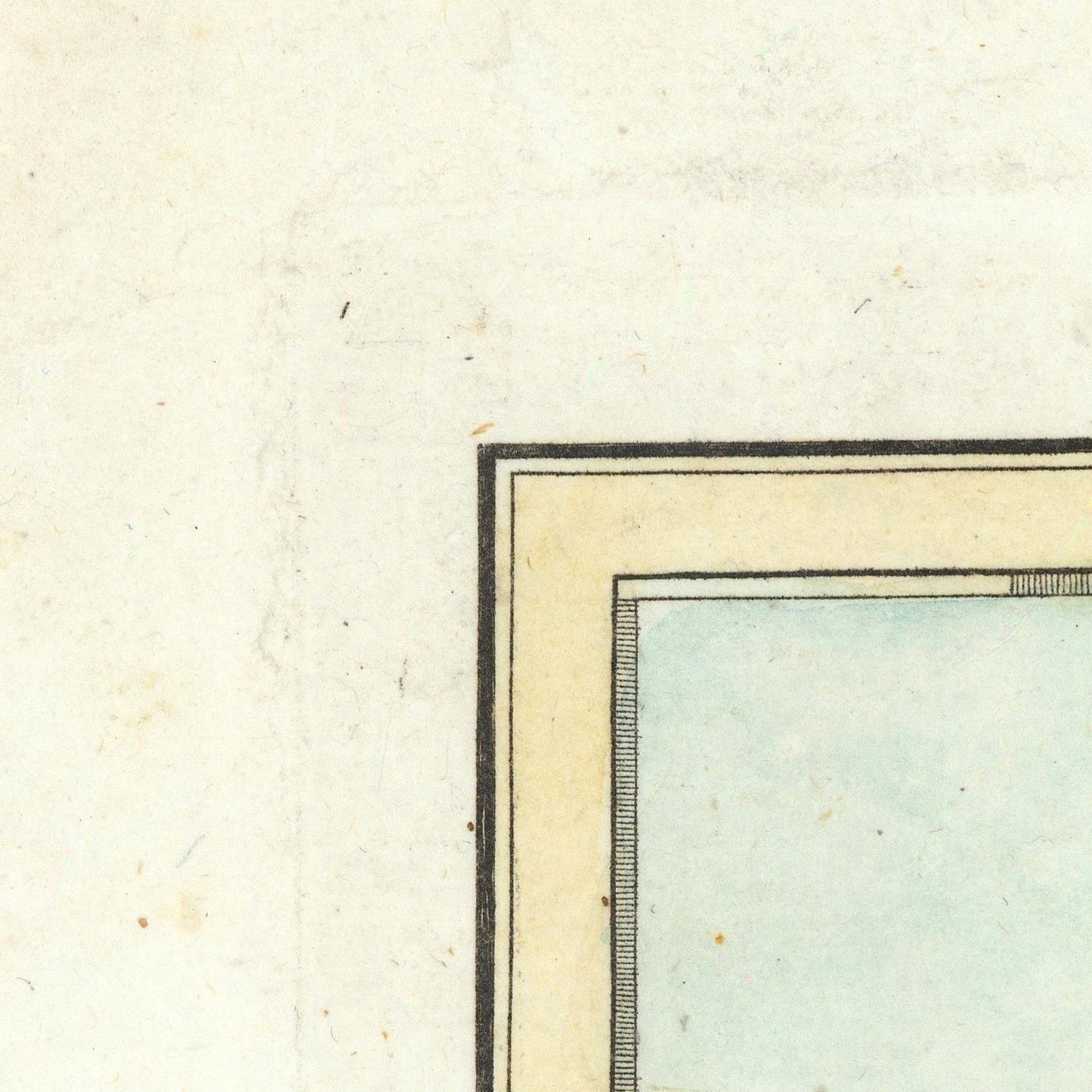 Corner of a textured paper with a black border