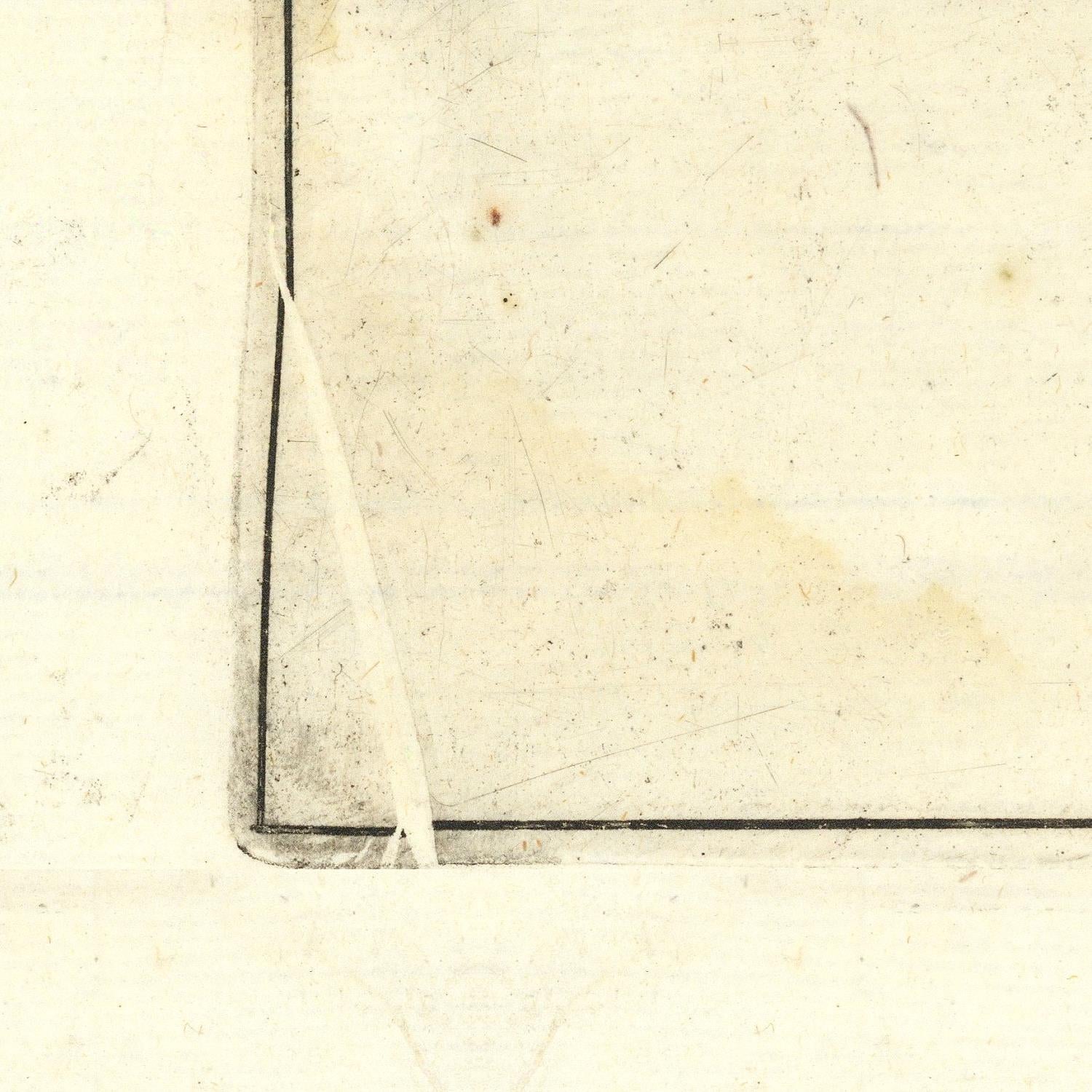 Close-up of a textured beige surface with a corner and edge visible