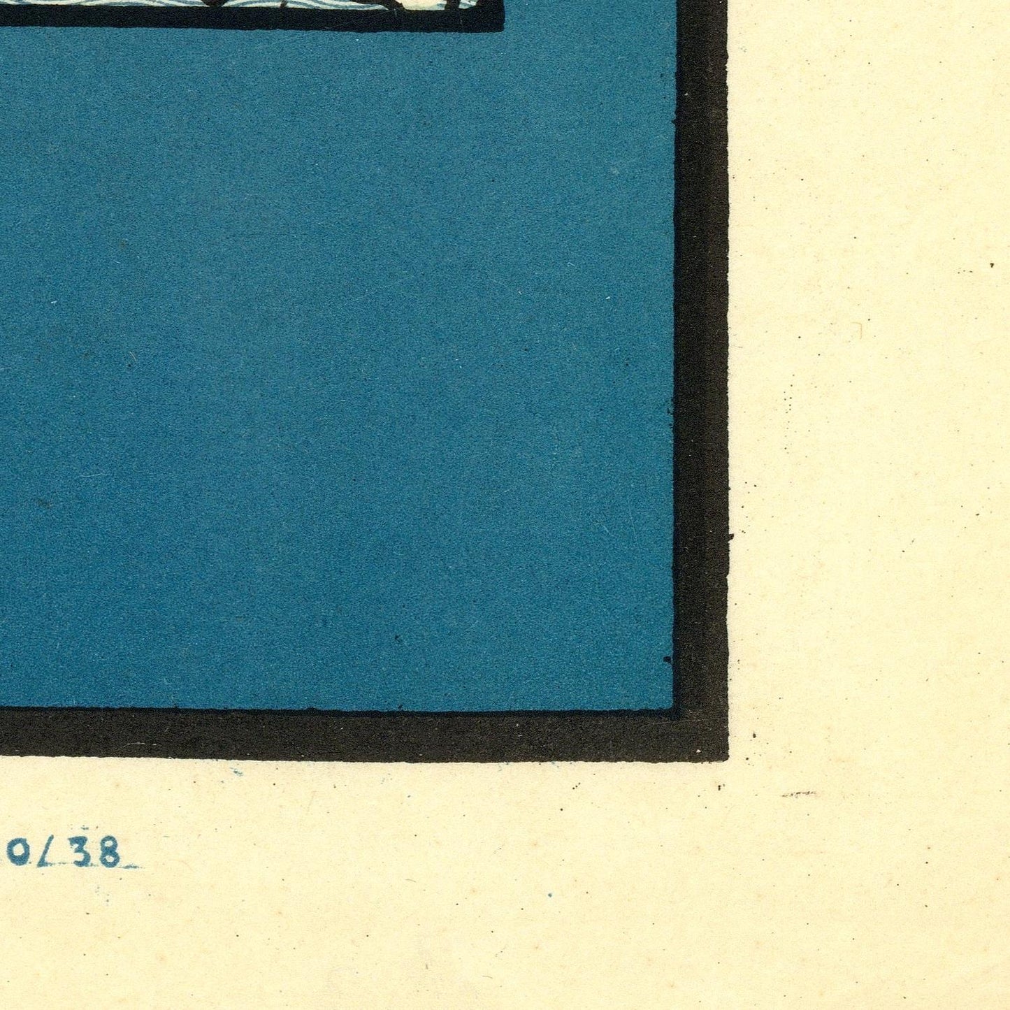 Close-up detail of a framed or matted artwork showing a large blue square section with a dark border on a warm cream background, with part of a black rectangular element at the top and small blue numbering at lower left.